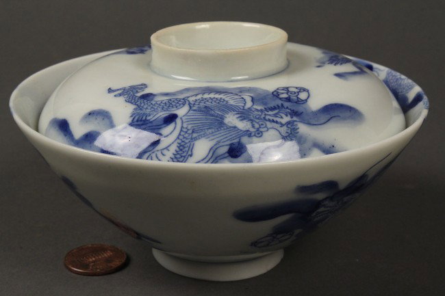 Blue & White Chinese Covered Bowl: Blue & White Chinese covered bowl, the outer surface decorated with five-toe dragon chasing the pearl of wisdom. Blue four character mark on underside of bowl and cover. Excellent condition. Bowl: 2" 