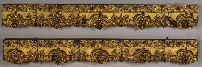 Pair of Victorian Metal Cornices: Pair of Victorian brass metal cornices, grape cluster with oak leaf design. Overall good condition, contemporary gilt paint with scattered oxidation, later wooden supports. 56 1/8" L x 6 1/4" H. 19th 