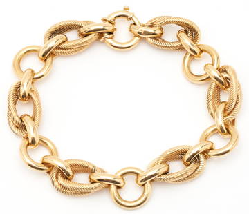 Nicolis Cola 18K Bracelet: Ladies 18K yellow gold bracelet by Nicolis Cola. The bracelet is marked "750", "Italy", and "Nicolis Cola". The bracelet is 9 1/2" L. Weight of the bracelet is 55.64 grams.The Estate of Anne Ford,