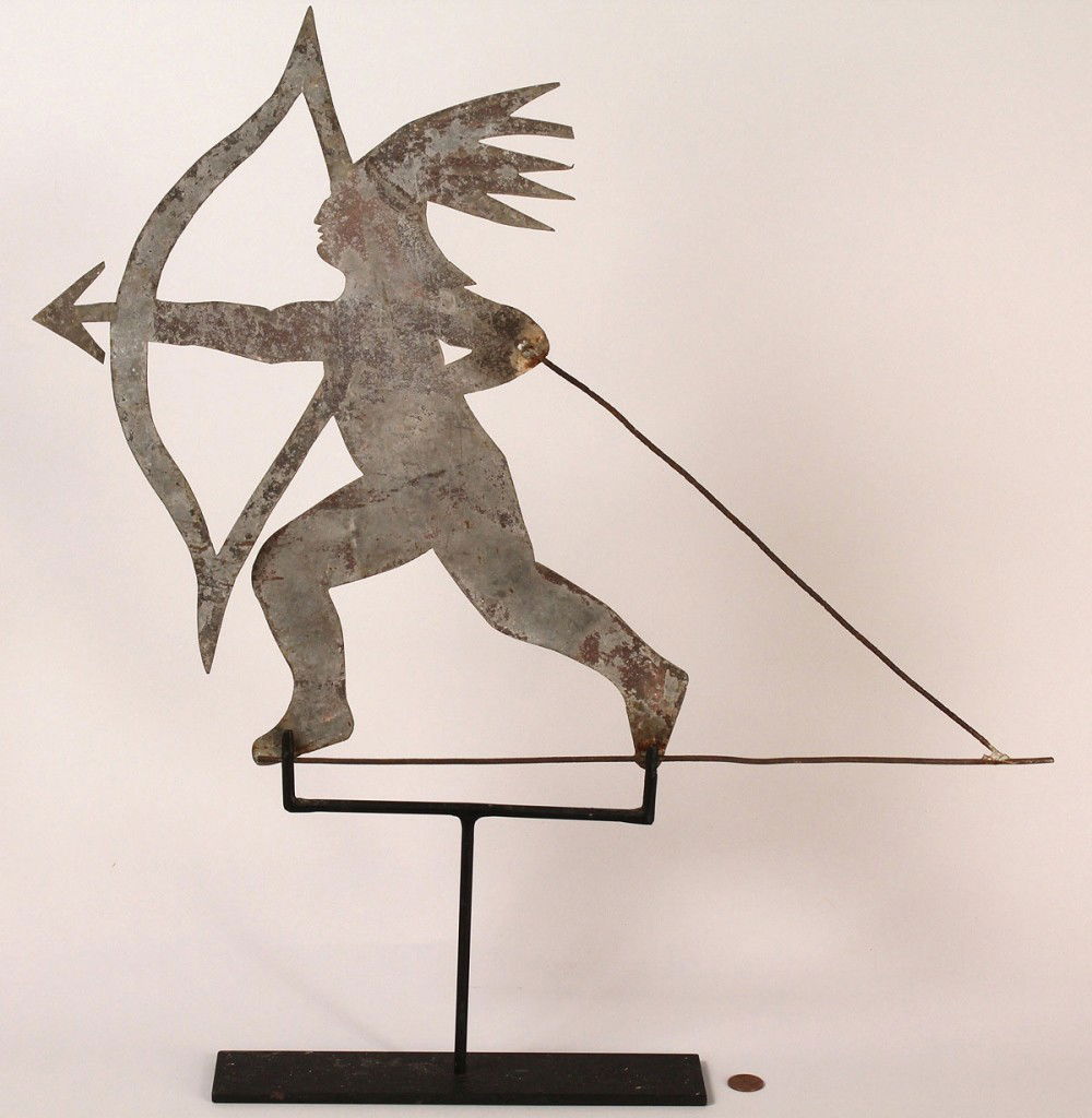 Weathervane, Native American with bow and arrow: Folk art painted sheet tin weathervane of a Native American with drawn bow and arrow. Later stand. 21"x 20 1/4". Late 19th/early 20th century. Provenance: estate of A. Welling LaGrone Jr., Nashville,