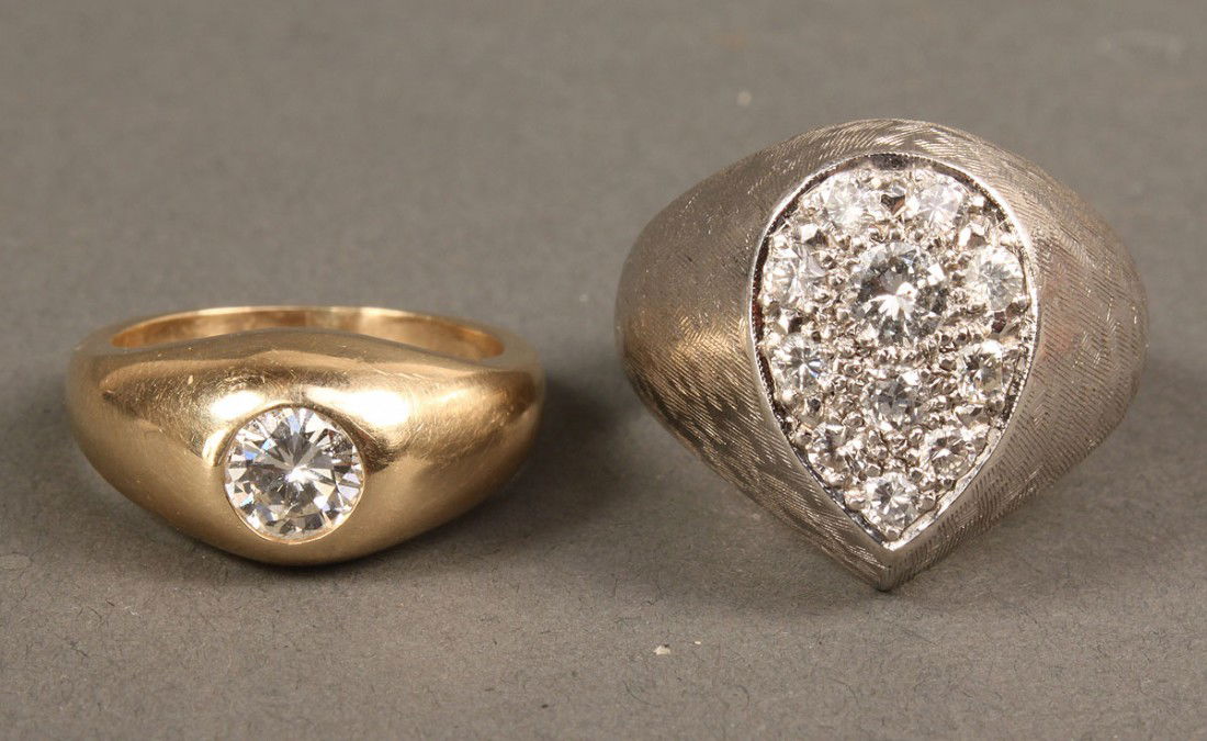 2 14K Diamond Rings, 1 with .75 ct diamond: Two 14K diamonds rings. 1ST ITEM: 14K yellow gold dome ring with bezel set center brilliant cut diamond weighing approximately .75 carat, G-H color and SI2 clarity. Size 6-3/4. 2ND ITEM: 14K white gol