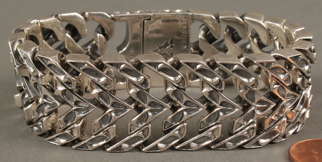 Men's Stephen Webster Sterling Logo Link Bracelet: Stephen Webster sterling silver Logo Link bracelet, designer mark on clasp. Marked 925 for sterling. 8-1/2" L x 1" W. 4.325 oz troy.
