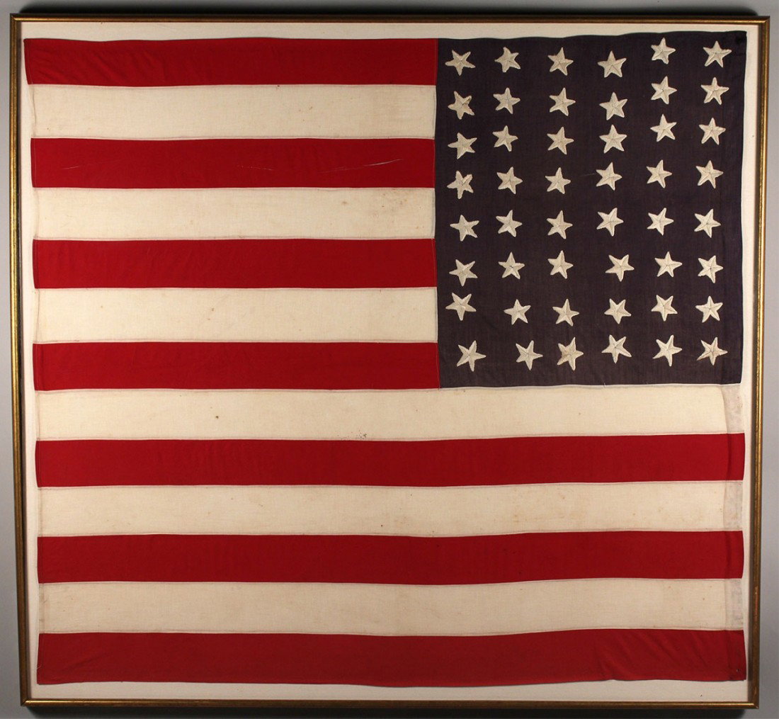 Large framed 48 star handmade flag: Large framed handmade 48 star cotton flag, stars are embroidered. Framed- 54" H x 58" W. Provenance: estate of A. Welling LaGrone Jr., Nashville, Tenn.
