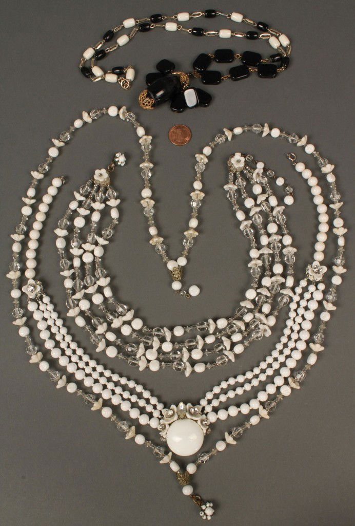 4 Miriam Haskell Necklaces: 4 Miriam Haskell Necklaces. 1ST ITEM: 3-strand white beaded necklace with center white disc, flower and crystal pendant, 19-1/2" L, maker's mark on back of pendant. 2ND ITEM: 4-strand crystal and whit