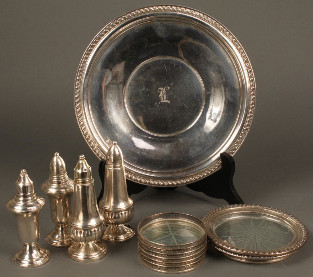 13 Silver & Glass items w/plate, coasters & s/p: Assorted lot of silver and glass coasters and salt and pepper shakers, 13 items total. Consists of six crystal coasters with reticulated silver rims, 3" diameter, marked sterling; two large 5" diamete
