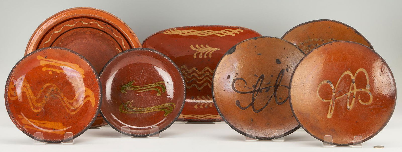 Collection of 7 Slipware Decorated Redware Plates (1 of 10)