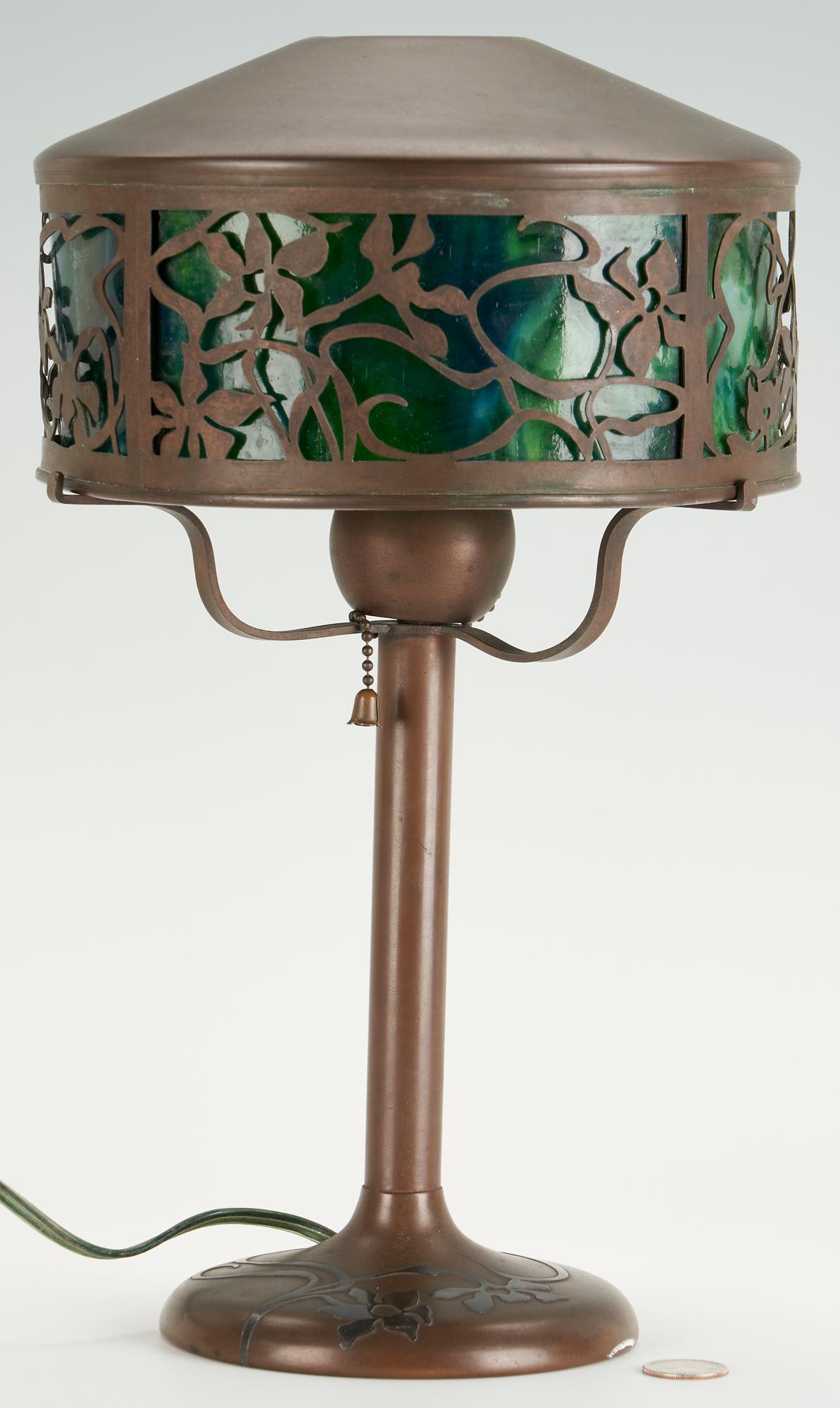 Heintz Bronze Table Lamp w/ Slag Glass Shade: Heintz Art Metal Shop Arts & Crafts patinated bronze table lamp with silver inlaid floral designs along the base, fitted with a foliate pierced bronze shade having a green slag glass liner. Unmarked.