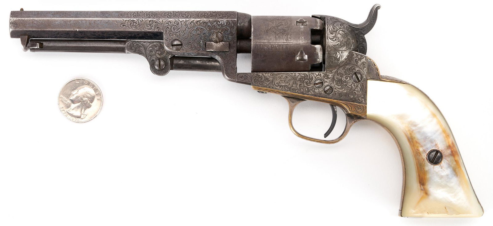 Factory Engraved Colt Model 1849 Revolver w/ Mother of Pearl Grips, .31 cal.: Factory Engraved Colt Model 1849 Pocket Percussion Revolver, .31 caliber, serial number 102291, all visible serial numbers matching. Top of barrel marked "Saml Colt," cylinder marked "COLT'S PATENT" w