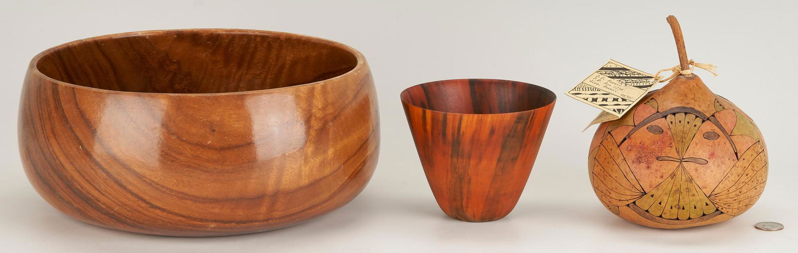 3 Hawaiian Bowls Incl. Ron Kent, Koa Bowl w/ NBC Provenance & Tom Kahalekoa Gourd: Three Hawaiian bowls.1st item: Ron Kent ( American/Hawaii, b. 1931) and Myra Kent small translucent Norfolk Island Pine turned wood bowl. Signed Ron/Myra Kent to underside. 4" H x 5 1/4" Dia. 2nd item