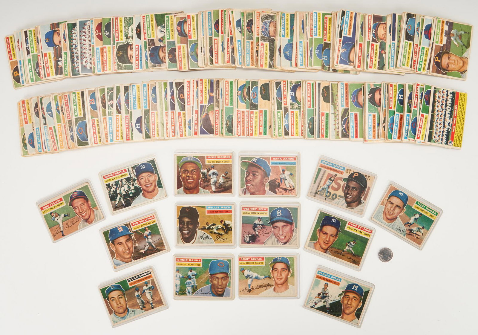 Collection of 282 Topps 1956 Baseball Cards, Mantle, Clemente, Aaron, Key HOFs: Partial set of Topps 1956 baseball cards, containing 282 of 340 cards issued that year, with a mixture of white and gray backs. Key cards include white-backed Mickey Mantle, Hank Aaron, Jackie Robinso