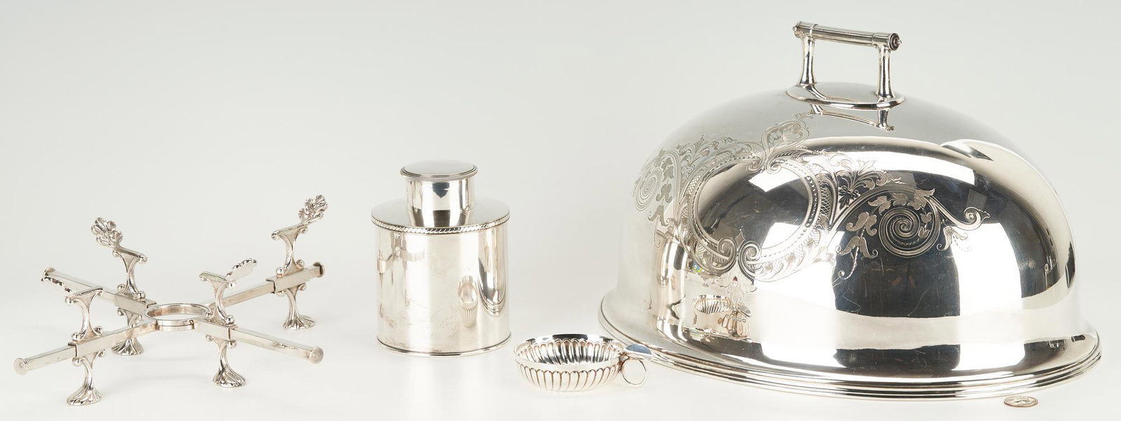 4 European Silverplated Items, incl. Christofle & Sheffield: 4 Silverplated Items: Tea Caddy, Meat Dome, Dish Cross, Wine Taster. 1st item: Christofle tea caddy with cord decorated rims and engraved anchor and rope crest. Maker's mark, 22, 32, and 5-32 A to und