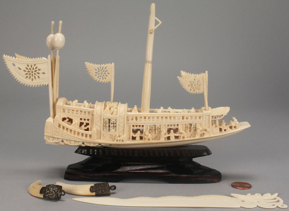 4 pcs Chinese Ivory including carved ship: Chinese Ivory Carving of a ship or pleasure boat, 20th century. Finely carved with miniature figures and swinging doors, with tall masts and flags, all on a wooden base, (9" L with flag x 7" H on base