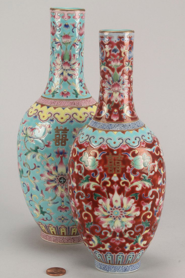 Chinese Famille Rose Porcelain "Double" Vase: Chinese Famille Rose Porcelain "Double" Vase, conjoined bottle form, each decorated with floral blossoms and scrolled foliates on enameled grounds, the larger robin's egg blue (9 1/2" H) and the other