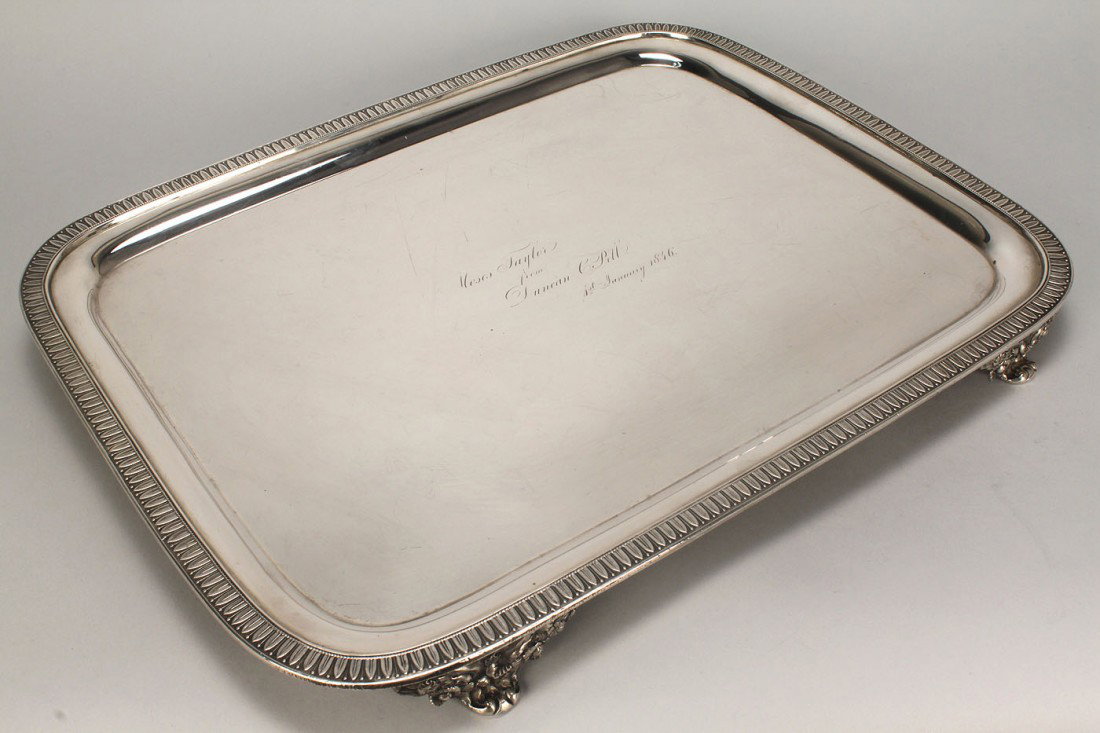 NY Coin Silver Tray, Moses Taylor inscription: New York Coin Silver Tray, footed, oblong with classical laurel-dart-and-bead border, raised on four acanthus floral scrolled feet. Plain center inscribed "Moses Taylor from Duncan C. Pell, 1st Januar