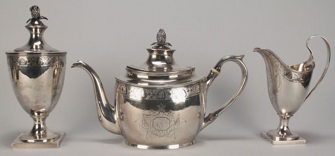 Assembled American Coin Silver Tea Set: Assembled Coin Silver tea service, all in the Federal style. 1st item: American coin silver teapot, marks for William Garrett Forbes, working in New York City between 1808-1833. Engraved band decorati
