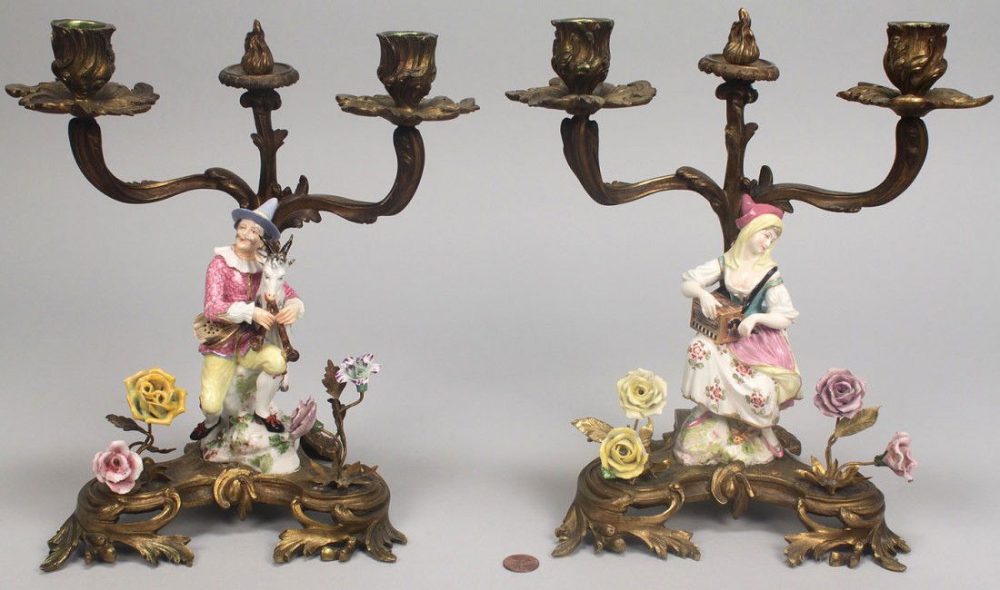 Pair Gilt Bronze & Meissen Porcelain Candleabra: Pair of gilt bronze and Meissen porcelain three-arm candleabra, one mounted with the figure of a woman playing a music box and the other mounted with the figure of a man holding a goat smoking pipes,