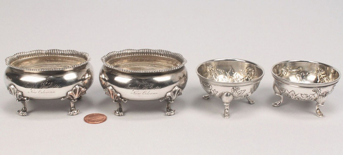 Four Coin Silver Salt Cellars incl. New Orleans: Four coin silver salt cellars. 1st pair: Oval cellars, each with flared and fluted rims, on four acanthus style scrolled feet. Old lion-anchor-G mark for Gorham, "coin", monogrammed "Joseph M. Estes, 
