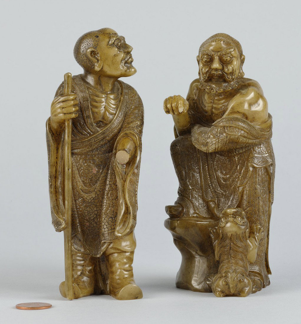 2 Chinese Carved Shoushan Lohans: Two (2) Chinese carved shoushan lohans, "Pantha the Younger" and " Vijraputra". 1st item - Chinese carved shoushan lohan" Pantha the Younger" depicting a standing lohan with the Buddhist staff in hand