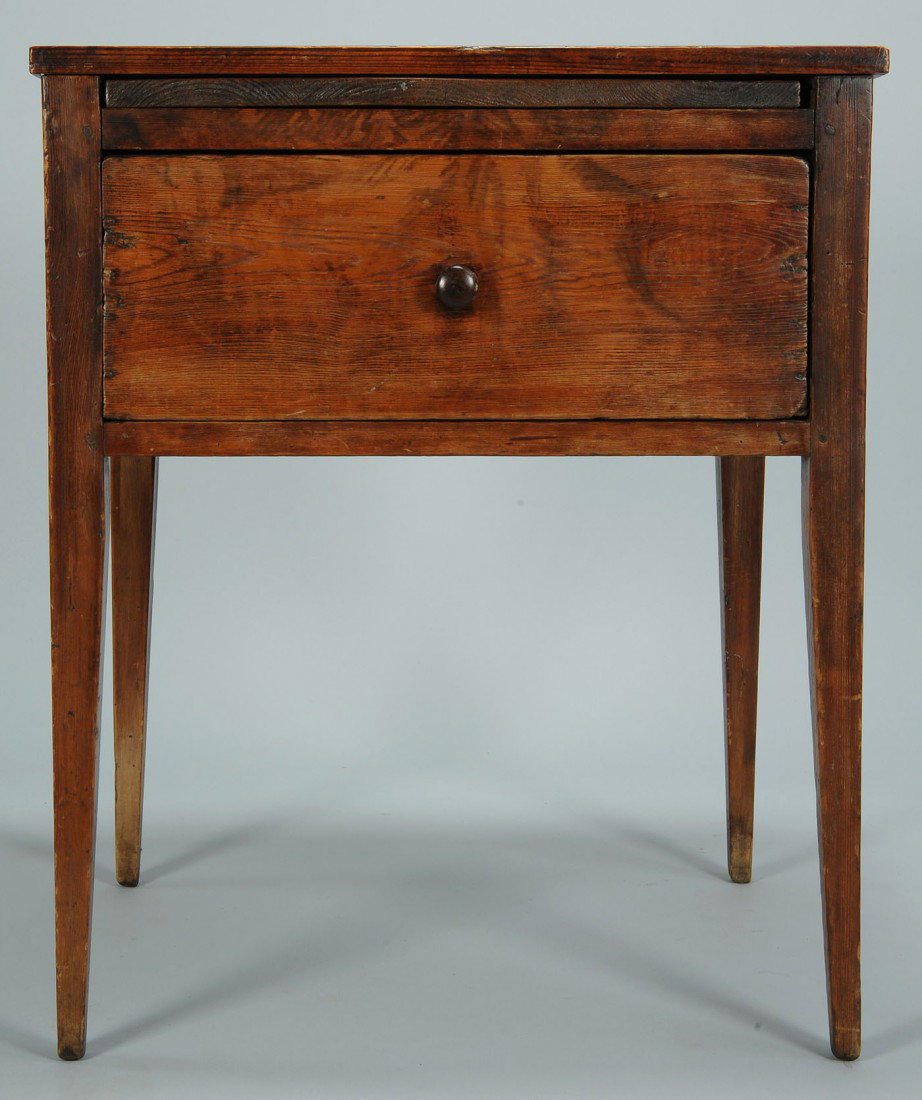 Southern Hepplewhite Yellow Pine table with slide: Hepplewhite yellow pine stand or table. Features a pull-out slide over a single large dovetailed drawer with evidence of earlier divider, on four square tapered legs. 30 1/2" H x 25 1/2" W x 19" D. So