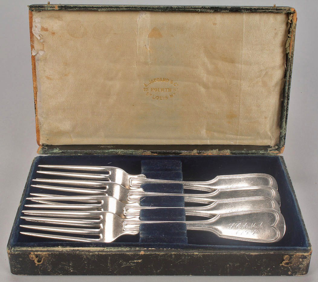 4 Jaccard silver presentation forks, poss. agricul: Boxed set of six coin silver or early sterling forks with Fiddle Thread handles, each inscribed on the handle "S.C.A.M.A. to A. & C. V.", and marked on back Jaccard & Co. St. Louis. Each 7-1/2"L, tota