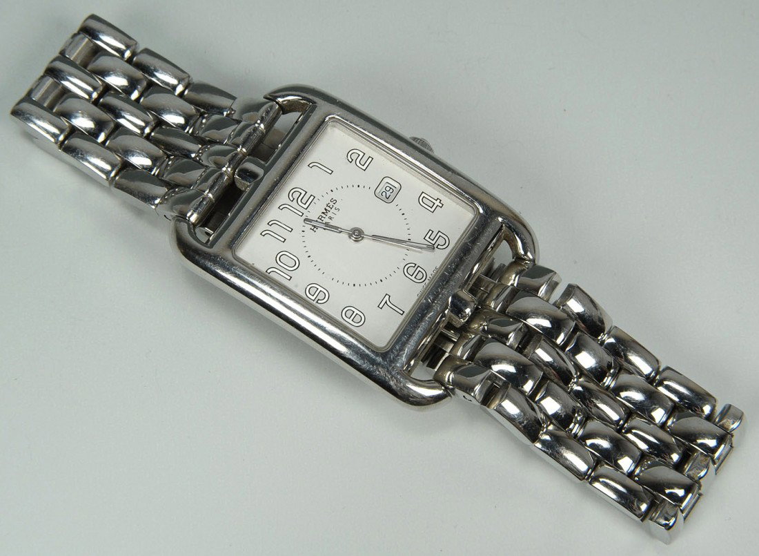 Hermes Stainless Steel Cape Cod Watch: Hermes stainless steel Cape Cod ladies' watch with stainless steel link band, model CC2-710, large face with white dial, quartz movement with date.