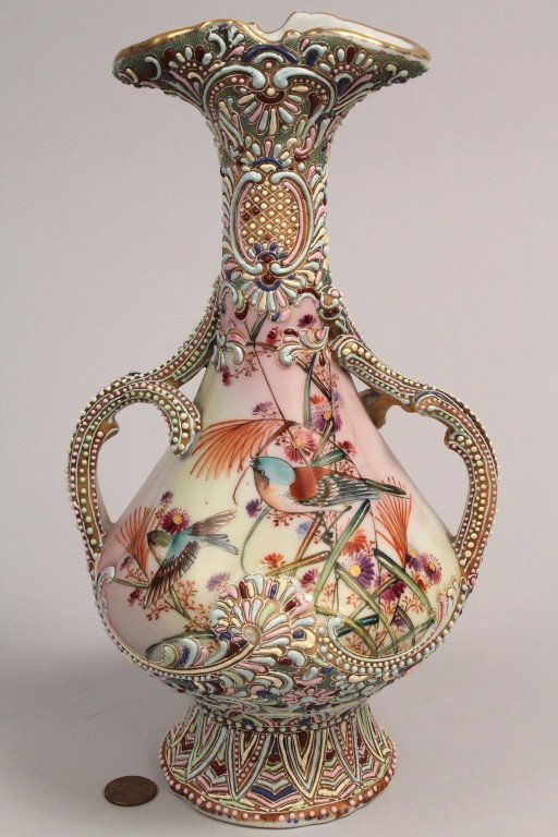 Nippon Moriage Double Handled Vase: Nippon Moriage double handled vase with hand painted bird and floral decoration along with beaded enamel and gilt decoration. Blue Japanese character marks on base. 10" H. First Quarter of 20th centur