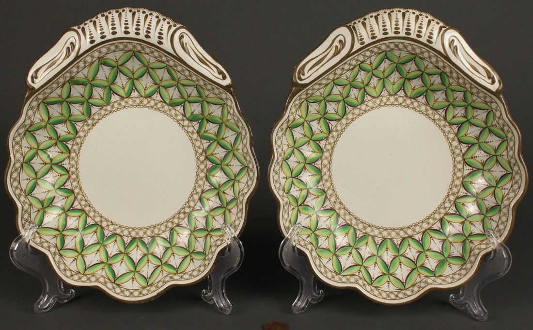 Pair of Spode creamware dessert dishes: A pair of Spode polychrome decorated creamware dessert dishes, each with olive borders and painted basketweave and green geometric designs. Impressed Spode 42 with painted numerals 3037. 1-1/2"H x 9-1