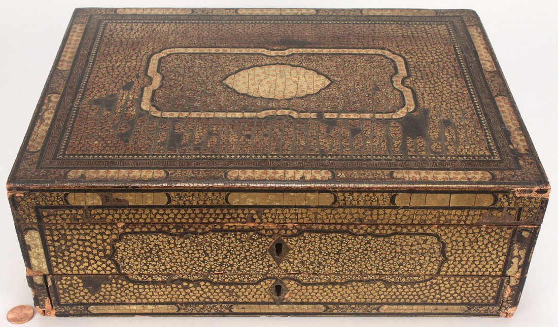 Lacquered sewing box with ivory fitted interior: Chinese Export lacquer sewing or work box, rectangular with gilt geometric design, the hinged lid opening to reveal a fitted interior with laquered and ivory dividers and a drawer section beneath. 19t