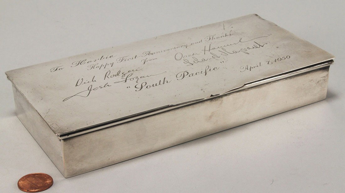 Sterling Box, Signed Rodgers, Hammerstein & More: Cartier sterling silver hinged cigarette box with the engraved signatures of four principals of the original Broadway production of "South Pacific": Richard Rogers, Oscar Hammerstein II, Josh Logan an