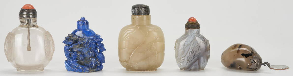 5 Carved Asian Snuff Bottles, incl. Lapis, Rock Quartz, Hardstone, Agate: Five (5) carved Chinese snuff bottles, including one (1) lapis bottle with carved crane and landscape decoration, one (1) large square form celadon-colored hardstone bottle with incised figural and ar