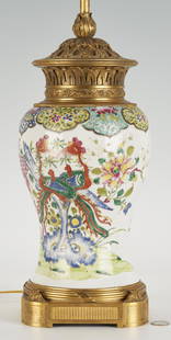 Chinese Famille Rose Ormolu Mounted Porcelain Vase Lamp: Qing gilt bronze mounted Famille Rose porcelain baluster form urn or vase with phoenix and foliate decoration, now wired as a lamp with ormolu Neoclassical mounts and a three-light socket. 32" total H