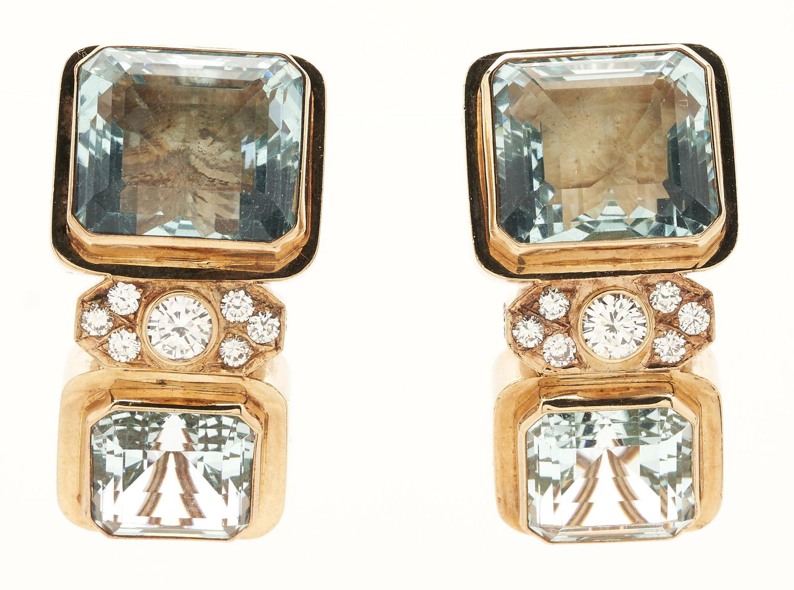 14K Aquamarine & Diamond Earrings: Ladies designer 14K yellow gold earrings featuring four (4) step cut natural aquamarines approximately 43.63 carats accented by twenty-two (22) round brilliant diamonds approximately 1.06 carats toget