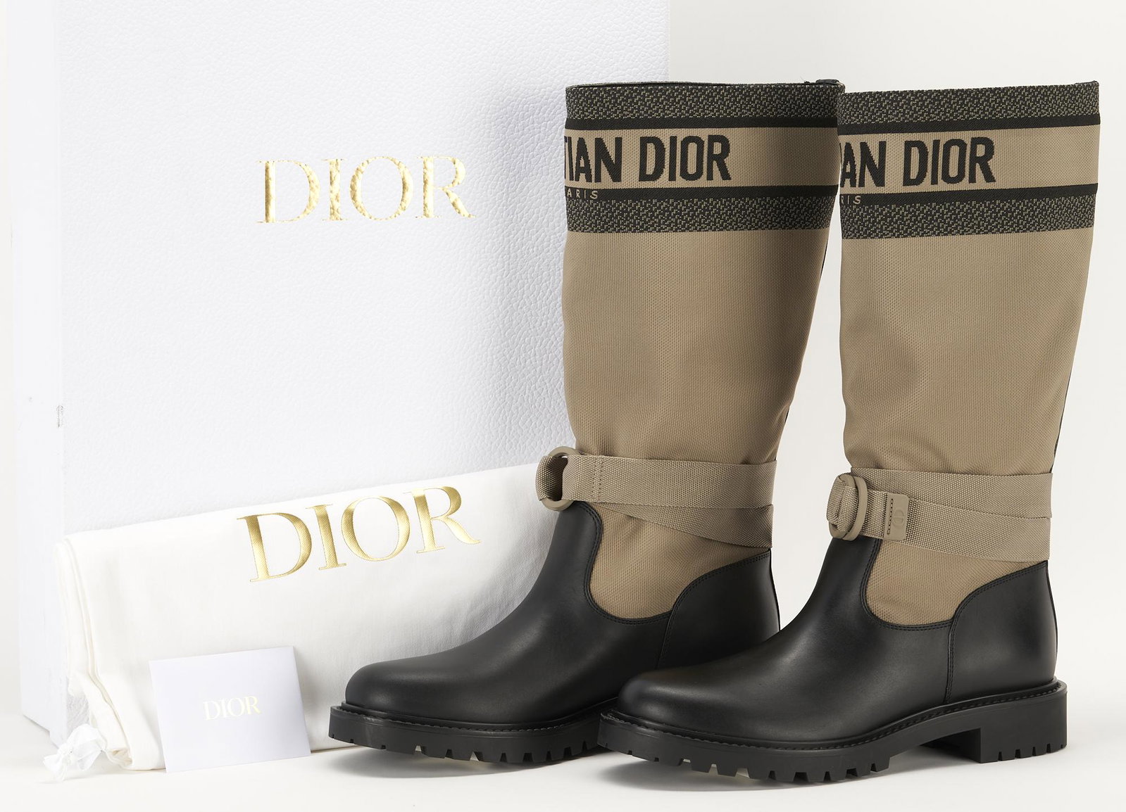 Dior D-Major Taupe Fabric & Black Calfskin Boots: Christian Dior "D-Major" long boots in taupe technical fabric and black calfskin, embellished with "Christian Dior" to top edge, "CD" to fabric adjustable ankle strap, and star tread to sole. Labeled 