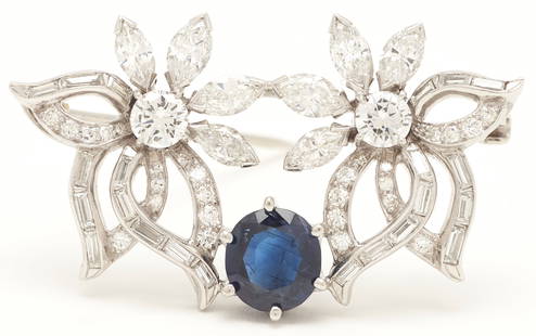 Platinum Diamond & Sapphire Brooch: Ladies platinum and 14K white gold floral brooch featuring twenty-eight (28) round brilliant, twenty-two (22) baguette, and eight (8) marquise cut diamonds approximately 2.75 carats together, Clarity-