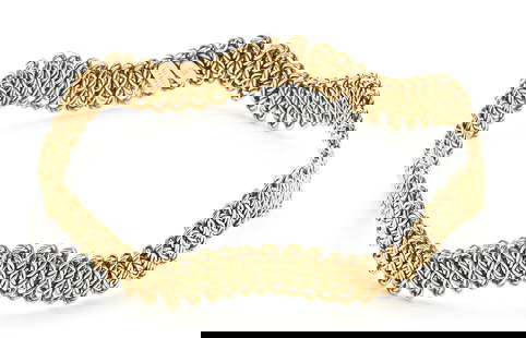 18K Braided Wave Bracelet, Tiffany & Co. France: Ladies' 18K yellow gold braided wave bracelet marked "Tiffany & Co France 18Kt". 1960s. XRF tests 18K gold. The bracelet is 8" in circumference and has a weight of 28.81 grams.