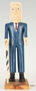 Ernest Patton Folk Art Carved Figure, "Man with Snake Cane": Ernest Patton (Kentucky, b. 1935) carved and painted sculpture of a white-haired man in blue suit and red tie holding a snake-carved walking stick. Signed in marker to underside of base, "Ernest Patto