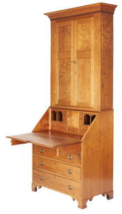 Tennessee Federal Cherry Secretary Bookcase: Middle Tennessee Federal secretary bookcase, two part construction, cherry primary and poplar secondary. The upper section with a flaring ogee molded cornice and dentil molding, above two paneled door