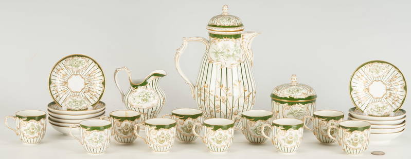 KPM Porcelain Green & Gold Coffee Service, 25 Pcs.: Twenty-five (25) piece KPM green and parcel-gilt porcelain coffee service with foliate branches to striped background and floral forms within molded cartouches, including one (1) coffeepot with bud fo