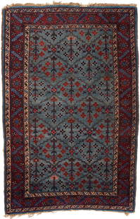 An Iranian Wool Rug: Wool on cotton foundation, light blue ground with all-over conjoining vines with repeating Tree of Life motifs, mauve boarder with repeating floral, angled devises, and two guard borders, mid-20th cen