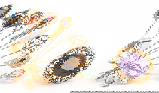 Gold & Gemstone Stickpin Brooch and 14K Amethyst Brooch: 1st item: Ladies 10K and 14K yellow gold stickpin brooch with eight (8) stickpins featuring a blue emerald cut glass, an oval garnet, a natural pink round sapphire, a round amethyst, a seed pearl, a n
