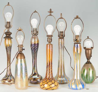 7 Studio Art Glass Lamp Bases: Grouping of seven (7) contemporary Studio Art Glass lamp bases including feathered, swirled and threaded designs. Ranging in size from 16 1/2" H to 23 1/2" H. 2nd half 20th century.