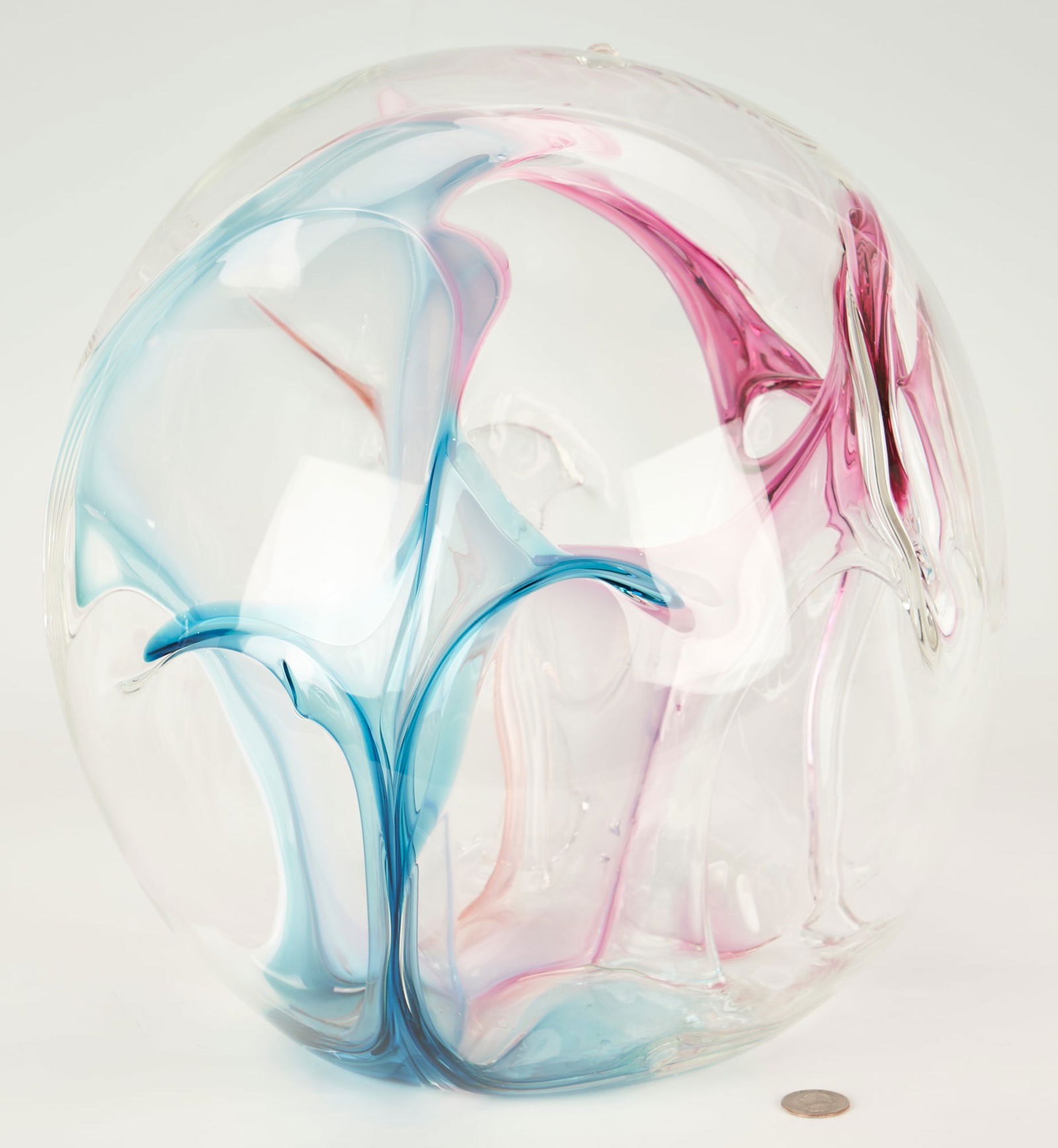 Peter Bramhall glass vase #1: Peter Bramhall (American, b. 1949) hand blown studio art glass sculpture, spherical form with internal stem forms of blue, white, and rose-lavender. Etched signature and date to underside. Jan. 25, 19