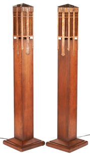 Pair of Stickley Newel Post Floor Lamps, ex - Naomi Judd: Stickley International Gus Newel Post Arts & Crafts floor lamps. Hammered copper with rectangular and reticulated frames, lined with amber mica, hinged pyramid shaped lid to access single light socket