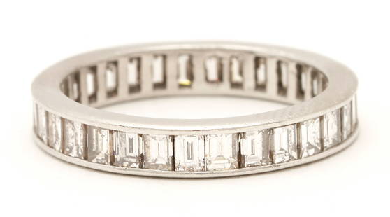 Platinum & Diamond Eternity Band: Ladies platinum eternity band featuring thirty-one (31) emerald cut diamonds approximately 2.17 carats together, Clarity-VS2, Color-G. The ring XRF tests 90% platinum and is size 7 3/4. Gross weight o