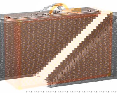 Louis Vuitton Hard Sided Suitcase, Alzer 80: Louis Vuitton hard sided suitcase model Alzer 80, exterior lined with brown LV monogram coated canvas, riveted natural tan leather trim, rolled leather handle, branded brass hardware with two trunk la
