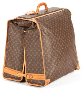 Louis Vuitton Bi-Fold/Pullman Garment Bag: Louis Vuitton hard top and soft sided bi-fold/pullman garment bag, exterior in brown LV monogram coated canvas, natural tan leather trim, rolled leather handle, branded brass hardware, leather badge i