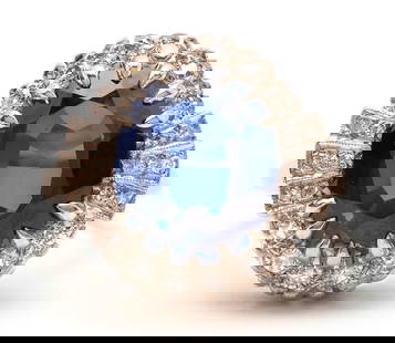 14K Sapphire & Diamond Ring: Ladies 14K white gold ring featuring a synthetic sapphire accented by twenty-four (24) single cut diamonds approximately 0.48 carats together, Clarity-VS1, Color-F. The ring is marked "14K" and XRF te