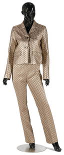 2-pc. Prada Metallic Gold Evening Suit: Two-piece (2) Prada evening suit in metallic gold and brown, including one (1) two-button blazer and one (1) pair of slacks, size 6 or Italian 40. Includes attached retail tags. PROVENANCE: East Tenne