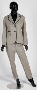 Prada Navy Check Blazer & Pants Set: Two-piece (2) Prada wool navy check ladies' pants suit with blue trim, including one (1) blazer, size 10 or Italian 46; and one (1) pair skinny pants, size 6 or Italian 42, includes attached retail ta