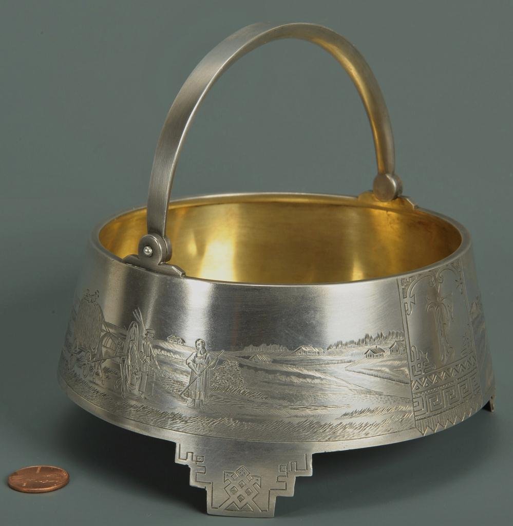 Russian Silver Sugar Basket with engraved farm scene: Russia Silver footed sugar basket with a very fine engraved agricultural and picnic scene with "TP" engraved in the central panel and the date 1881 on opposite panel. The interior with original gold w